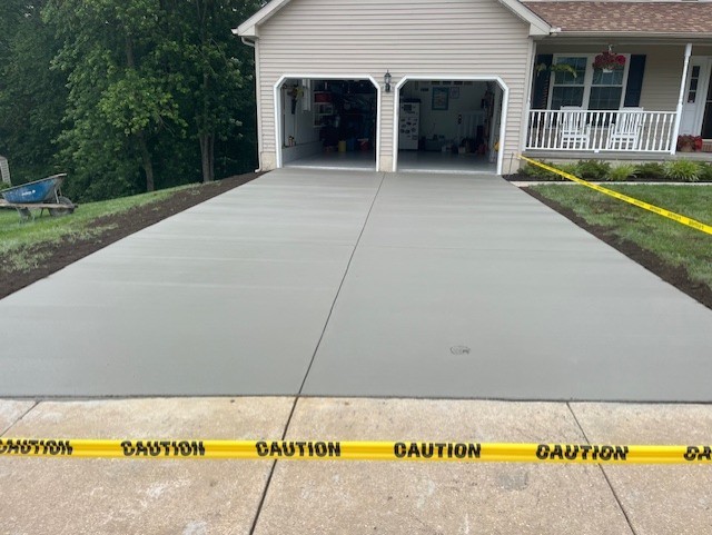 Finished residential concrete driveway installation at a home in Newark, Delaware