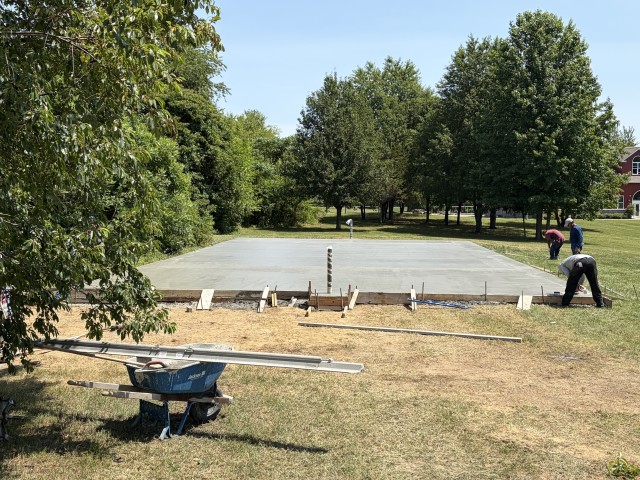 Residential concrete basketball court installation in Townsend, Delaware