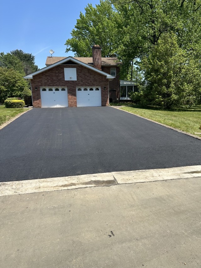 New residential asphalt driveway installation in Newark, Delaware