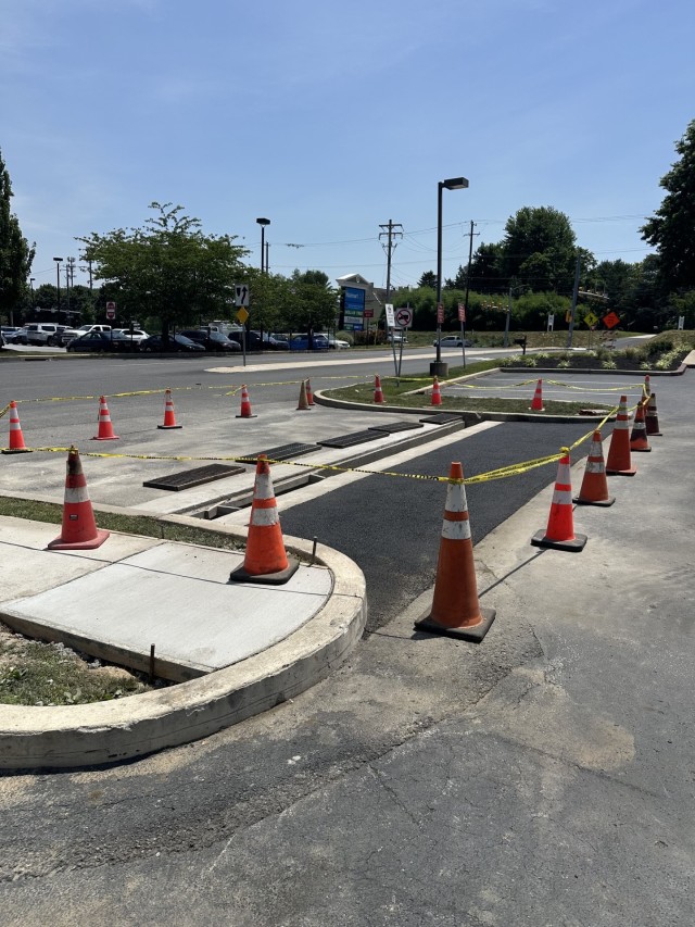 Commercial concrete and asphalt apron and drainage installation at Applebee's in North Wilmington, Delaware