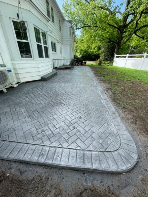 Residential stamped concrete patio and outdoor living area in Wilmington, Delaware